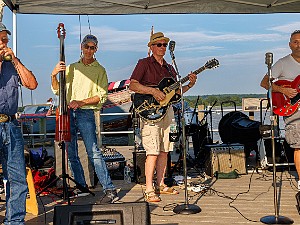 Classic Rock "on the Dock" with Java Groove Despite a long stretch of extreme heat and humidity, it was actually decent weather for Java Groove to do their thing in...