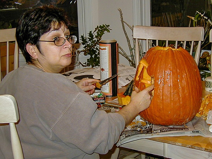 Halloween2003-002 Max has great fun with her new pumpkin carving tools 🎃
