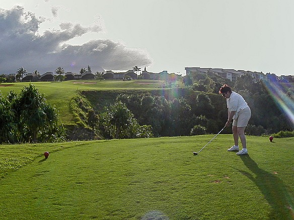 Hawaii2001-007 Max tees off on the 7th 🏌️‍♀️ The hazard this time is that huge chasm with the green on top of the cliff on the other side. Needless to say, many balls were...