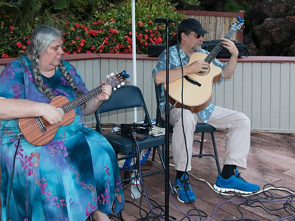 Tuesday evening was the celebration around the main pool after the annual home and vacation owners association meeting.  Doug McMaster on slack key guitar and his wife Sandy on ukulele  provided entertainment. May 13, 2014 6:47 PM : Doug McMaster, Kauai, Sandy McMaster