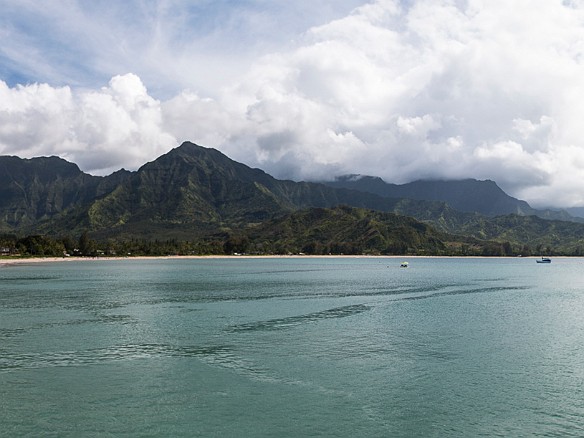 Mike takes in the quite amazing panoramic view of the bay and the mountains from the historic Hanalei Pier May 15, 2016 3:35 PM : Michael Strasser