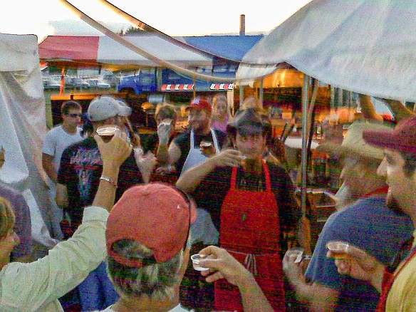RhythmRoots2009-9 Chili Brothers tradition is "Sunset Break" where all the vendors stop in their tracks, gather at the Chilis, and toast the setting sun.