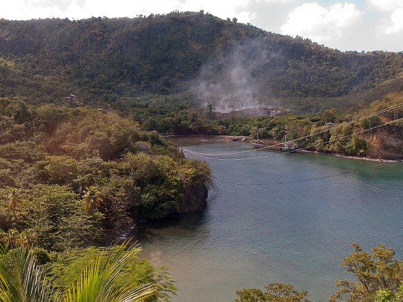 Yep, that's a burning landfill, and in the cove is a derelict ship that was scuttled during a past hurricane Jan 14, 2010 9:56 AM : Grenada, SilverSea Caribbean Cruise 2010