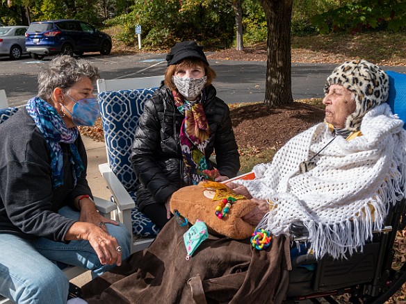 Myra 2021-10-23-009 It was a crisp Fall day for sitting outside at Ocean Meadow with Myra, singing a few songs, talking story, and collecting colorful maple leaves