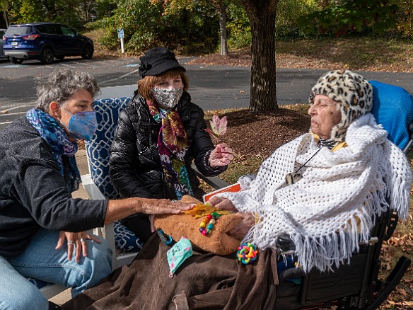 Myra 2021-10-23-010 It was a crisp Fall day for sitting outside at Ocean Meadow with Myra, singing a few songs, talking story, and collecting colorful maple leaves