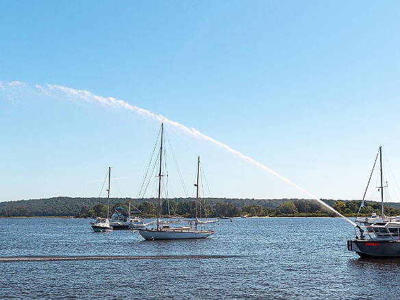 FireboatsAndFirefighters-20210911-029 The town's new fireboat, the "Joseph H" dedicated to Joe Heller, showed off it's capabilities to the crowded dock