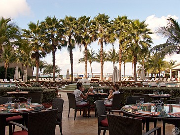 GrandCayman2011-011 Breakfast outdoors overlooking the pool