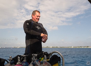 Diving0202-DocPoulson-002 Chris suits up before the morning dive.