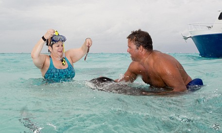 The sandbar at Stingray City is only 3-4 feet deep in some places. Chris took us out there privately for an awesome afternoon. Max got into the water and started feeding squid to the stingrays that started swarming us. Feb 3, 2012 1:54 PM : Diving, Grand Cayman, Maxine Klein