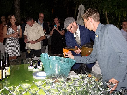 The gala started with cocktails on the outdoor patio at Blue by master mixologist Adam Seger. Martini glasses chilled with ice water while he concocted a mad scientist giant beaker of 100 year old armagnac, japanese pear liquer, and several other exotic ingredients. With all of the macerated herbs, the slurry had to be poured through a filter funnel into the cocktail shakers. Jan 20, 2013 7:01 PM : Adam Seger, Grand Cayman