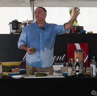 CaymanCookout2014Day1-033 While the Fideuà cooks, Jose starts showing how to make a pisco punch, whereupon he spills the whole drink shaker down the front of his pants