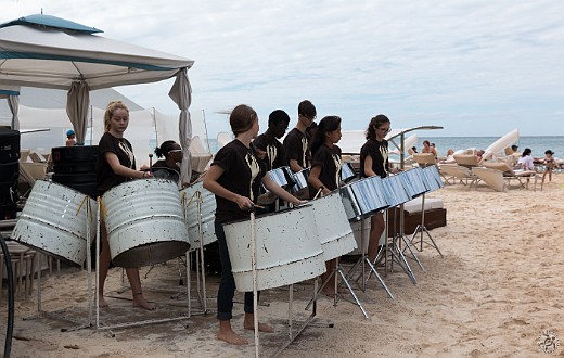 Cayman Cookout Day 2 started around 11am with Burgers in Paradise on the beach in front of the Ritz. The local high school steel band provided the entertainment. Jan 18, 2014 12:22 PM : Grand Cayman : Maxine Klein,David Zeleznik,Daniel Boulud