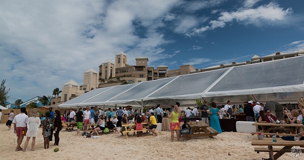 Due to the iffy weather, they setup under huge polyethylene tenting to block rain and wind. Jan 18, 2014 1:56 PM : Grand Cayman : Maxine Klein,David Zeleznik,Daniel Boulud