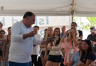 CaymanCookout2015Day1-045 José compares the recipe in his book to what he just cooked, and is a bit disturbed that they don't quite match up