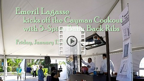 GrandCayman2017-EmerilLagasse Emeril shows how he does Asian-influenced 5-spice baby back ribs that are wrapped in plastic and aluminum foil, and then cooked under low heat in the oven