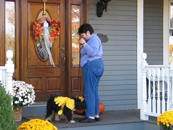 Halloween 2004-004 I'm not sure what I'm supposed to do, but Mommy rings the bell