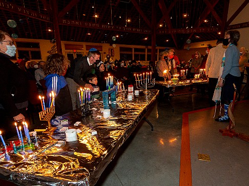 Latkepalooza 2021-016 After-dinner services and the lighting of all the hannukiahs, led by guest Rabbi Jon Haddon