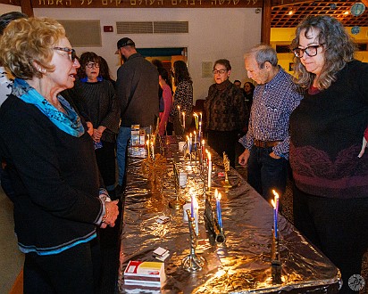 Latkepalooza2023-019 Everyone brings their hanukkiah (Chanukkah menorah) which creates quite the holiday display 🕎