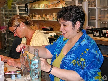 Oahu2004-009 Max creates some colorful oil and vinegar dispensers