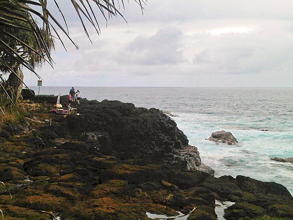 View of the lava shelf, the "bath" itself is a pool carved out just beyond the edge of the photo. Surf was up and the rocks were very slippery. This is as far as I went! May 2, 2010 11:16 AM