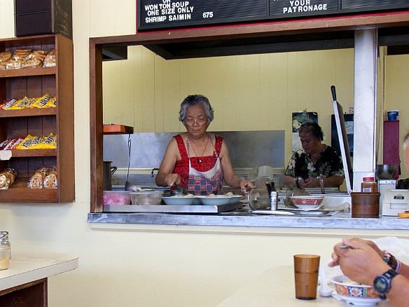 The 'aunties" ladle out the steaming saimin into bowls May 9, 2010 1:27 PM