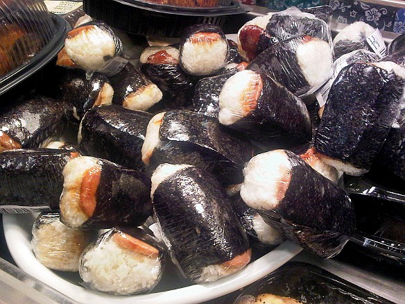 Mmmm.... Saw this display in the deli section of the grocery store. Musubi- grilled spam on rice, wrapped in nori. May 13, 2010 3:08 PM