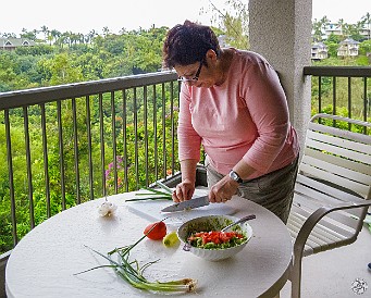 Kauai2011-035 Too dark inside with the power out, the culinary arts conclude on the lanai as we wait for power to be restored... The soggy saga continues...