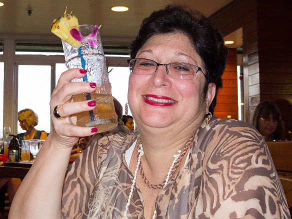 Maxine enjoys her complimentary mai-tai! May 15, 2012 7:03 PM : Kauai, Maxine Klein