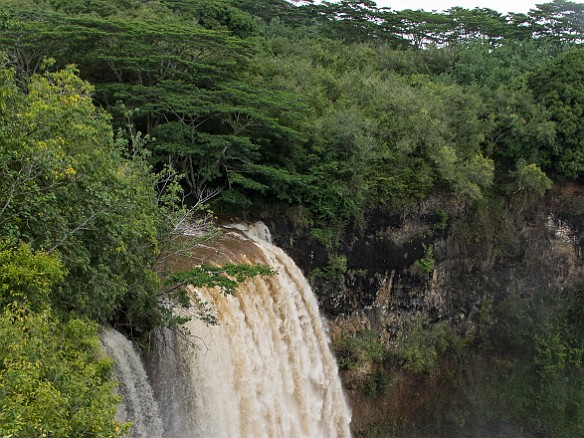 Still kind of drizzly the next day, so we drove up to the Wailua Falls overlook (da plane boss, da plane!). Wow, with all of the rain it was raging brown. Normally it's a dual falls, but not today! May 13, 2013 1:42 PM : Kauai