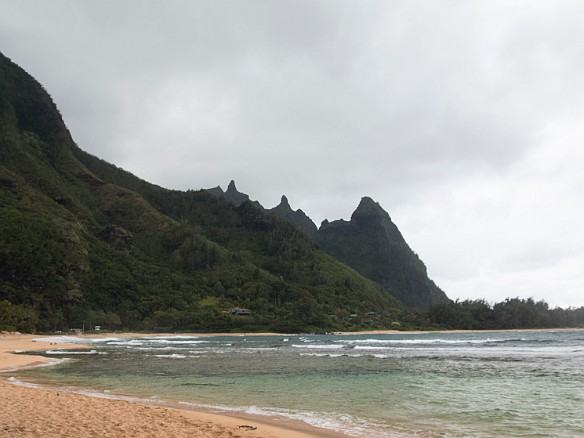 We continued giving Rob and Janie the $0.50 tour of North Shore beaches. The main parking alley for Tunnels Beach has all of 6 spots and it is always next to impossible to find one free. So, we pulled into the alley and I thought we were at the wrong place because it was completely empty. Marveling at our good fortune, we pulled the beach chairs from the trunk and planted ourselves on the beach.  Even on a cloudy day, the view of Bali Hai amazes. May 11, 2014 2:55 PM