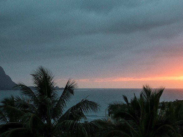 We returned to the resort to shower and get ready for dinner. The iffy weather and high North Shore surf is supposed to continue through the first half of the week, meaning that my initial diving plans have been canceled. This is the best sorta-sunset we've had so far. May 11, 2014 7:04 PM : Kauai