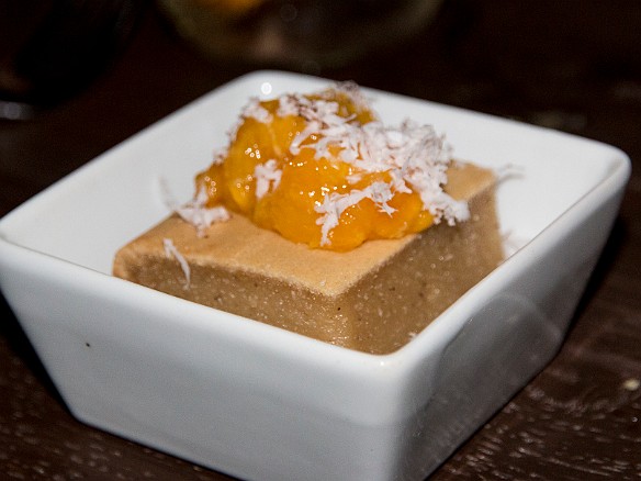 A coconut mochi cake, topped with mango and roasted shaved coconut May 22, 2014 8:02 PM