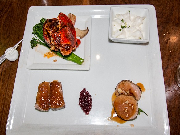 The "surf and turf" course. Yes, that does look like a Maine lobstah claw at the upper left. Apparently, someone on the Big Island is taking Maine lobster larvae and farm raising them there! Here it was done up in 7-spice powder. Lower left is Wagyu beef and lower right was pork tenderloin medallions. The intense lemon creme fraiche at the top right was for the lobster. May 7, 2014 9:26 PM : Oahu