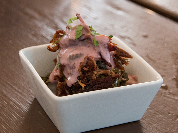 Kalua pig with hand pounded poi, on top of sauteed taro leaves May 14, 2015 6:57 PM : Kauai : Debra Zeleznik,David Zeleznik,Jawea Mockabee,Maxine Klein,Mary Wilkowski