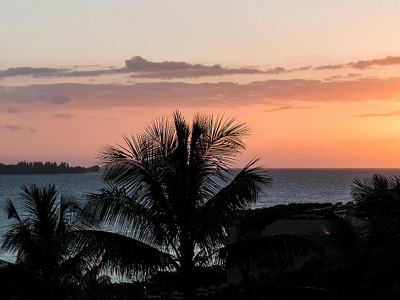 Tuesday night almost-sunset from the lawn at Hanalei Bay Resort. Just after this photo, the sun dipped behind the clouds, but it was pretty while it lasted. May 19, 2015 7:07 PM : sunset