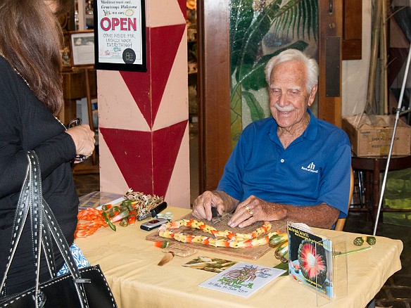 This fellow was demonstrating making hala leis, from the fruit of the pandanus tree. May 8, 2015 11:17 AM : Oahu