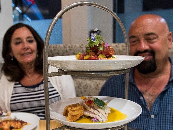 Rona and Michael contemplate the massive seafood tower May 18, 2016 7:46 PM : Michael Strasser, Rona Burke