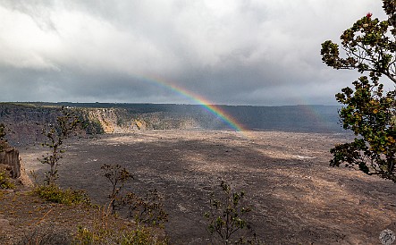 HiloVolcano-015 A rainbow and the slight tinge of a second one greeted our first view of the crater. Most of what you see is an old lava lake, although you can see some puffs...