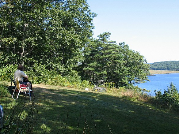 Bill plays guitar over the backyard view of the Kennebec Sep 3, 2004 11:40 AM : Billy Laughlin, Maine