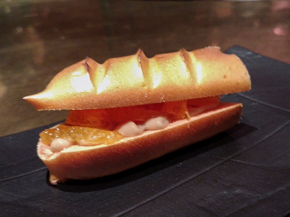 "Bocadillo" is literally a type of Spanish sandwich. In this case, the "bread" was carrot meringue (yes, carrot!) in the shape of a carrot. I honestly don't remember what was inside- yet some more molecular wizardry, but I do remember it being awesomely good. Even Max liked it and she doesn't eat carrots. Mar 19, 2016 9:52 PM