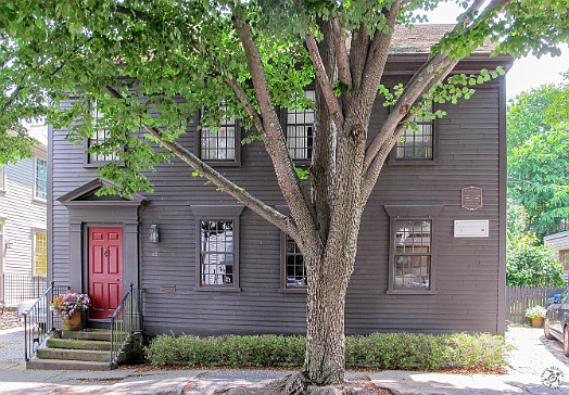 Newport2019-014 Captain George Buckmaster, a wealthy sea merchant and Congregationalist, built his house in 1768. Notably, he rented rooms to Isaac Touro, the spiritual leader...