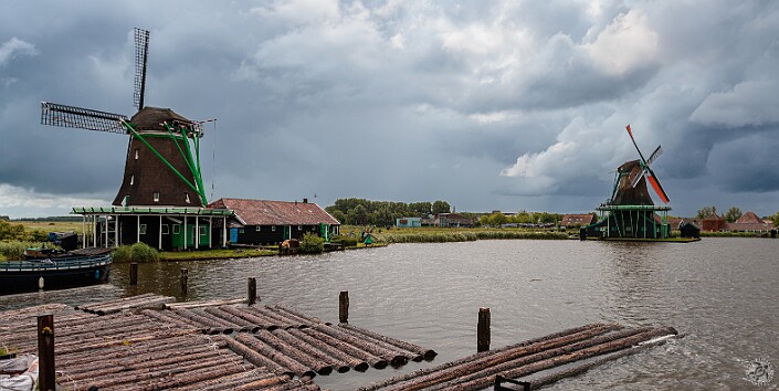 Amsterdam2025-043 View out the back of the Het Jonge Schaap sawmill's loading ramp showing the floating logs waiting to be hauled up by block and tackle.