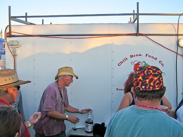 The customers wait while Pa pours the shots for sunset break Sep 5, 2010 7:34 PM : Chili Brothers, Ken Lamb, Rhythm and Roots 2010, sunset