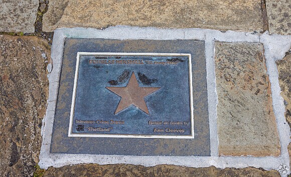 Shetland2024-030 There's even a plaque to DI Jimmy Perez in the sidewalk in front of the Lerwick Police Station