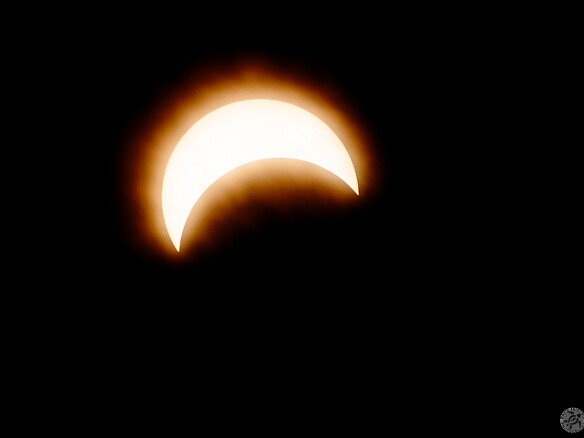 Solar Eclipse 2017-070-Enhanced-NR45 Shortly after maximum obscuration, thick cloud cover came in. The glow in the photo are the clouds, not any solar flares or corona.