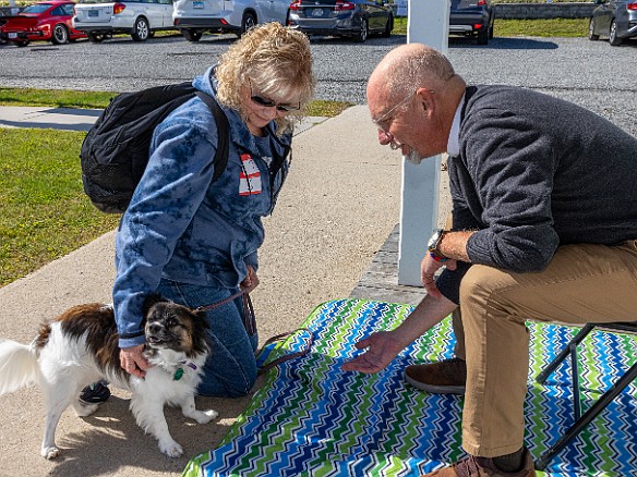 DogsOnTheDock2022-011 The new minister of the First Congregation Church of Essex, the Rev. Dave Stambaugh, blessed the dogs.