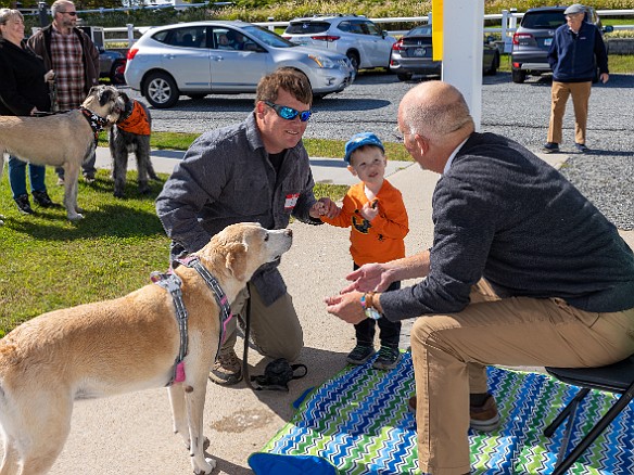 DogsOnTheDock2022-020 The new minister of the First Congregation Church of Essex, the Rev. Dave Stambaugh, blessed the dogs.