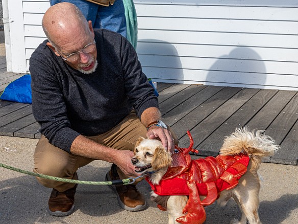 DogsOnTheDock2022-032 The new minister of the First Congregation Church of Essex, the Rev. Dave Stambaugh, blessed the dogs.