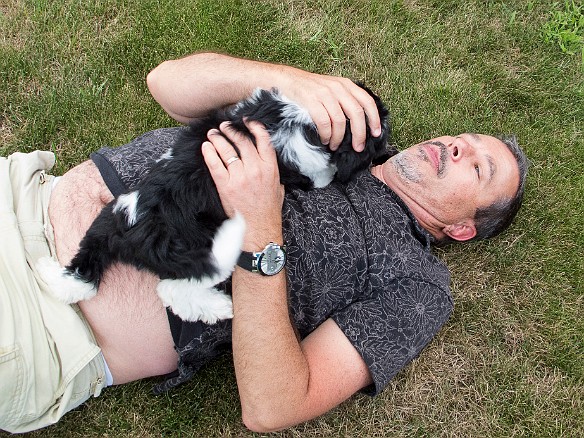 ComingHome-007 Sophie slept most of the 2 hour drive home. Upon seeing her new front yard, she immediately had to tackle daddy.