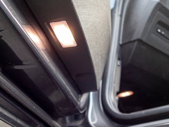 Puddle Lights-001 All late-model BMW's, including the M2, have puddle lights at the bottom of the doors which illuminate the ground when you are getting into or out of the...